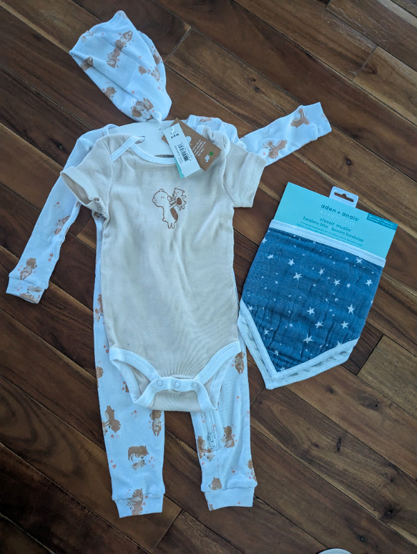 Bodysuits 3pc set 6-9M + bibs/ still available don't ask in Clothing - 6-9 Months in Calgary