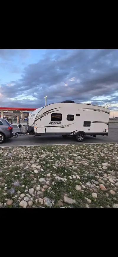 I'm selling my used 2013 EverGreen Ascend RV trailer, a cozy and well-maintained travel trailer perf...