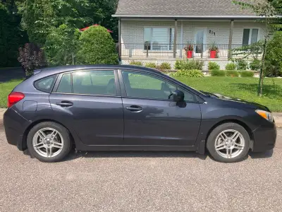 Subaru Impreza manuel 2014 268154 km, bon état mécanique (bon entretien) avec 8 mags, pneus d’été et...