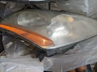Headlight assembly for Honda Odyssey 2006, also Nissan Murano 2006 and Toyota Corolla 2000-05. Any 1...