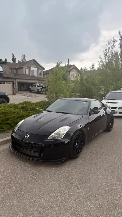 Selling my 2003 Nissan 350z. Exterior • KBD Nismo V2 Front Bumper • Stage 2.1 Vented Hood • 06-08 He...