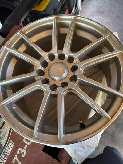 Used Full Set of Akita Racing 17 inch rims. 7 inch width. 2 bolt patterns to choose from. Good shape...