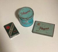 Assortment of vintage tin cans