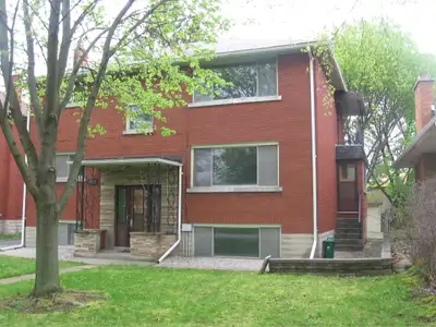 Large bright lower unit one bedroom apartment in quiet, well maintained triplex. -Rent includes one...