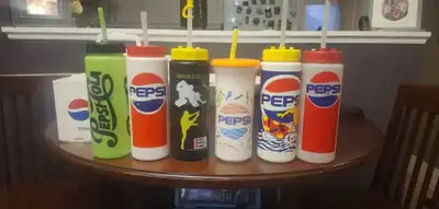 Selling off 6 retro Pepsi water bottles with a carrier. All are clean and in really good shape minus...