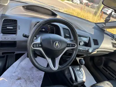 Acura CSX with brand new brakes and rotors oil change done new starter very low mileage 155000 km. T...