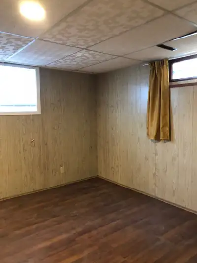 Basement suite 2 bedroom + den 5 minutes walking to CTrain