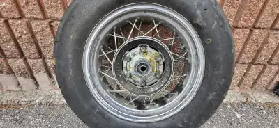 15" stock rear rim off a 2005 vstar 1100 custom including hub, bearings and tire. Tire is in good co...