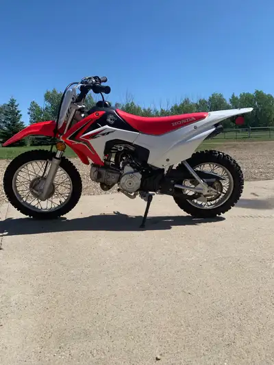 2013 Honda 110 CRF dirtbike. Bought new, barely ridden excellent condition, electric start and kicks...