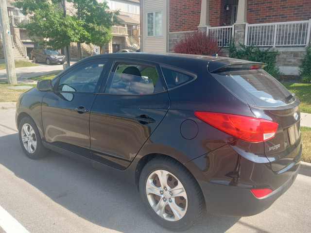 2014 Hyundai Tucson 5 speed, 2 Sets of Tires on Rims , ICE AC in Cars & Trucks in Hamilton