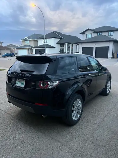 Looking to sell my Land Rover Discovery, a sleek black SUV that's ready for any adventure! While thi...