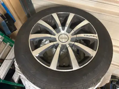 Selling a set of rims and all season tires, Size 185 65 R 15 all season tires the tires have only be...