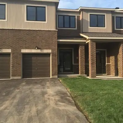 Less than 4 years NEW executive townhouse sitting on a premium lot with a finished basement availabl...