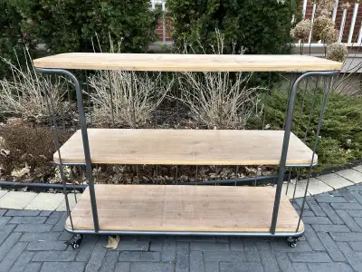 Elevate your space with this stylish industrial style unique bookshelf! This shelf features three ti...