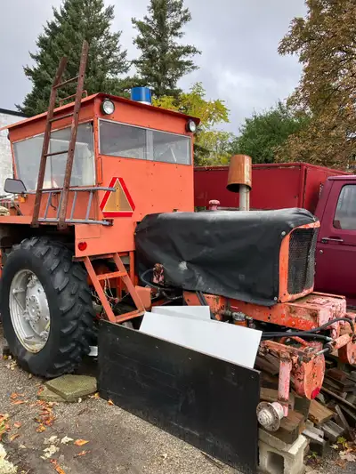 Allis-Chalmers WD tractor complete with snowblower. Not currently running—no compression in one cyli...