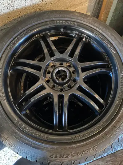 Set of 4 black, 17 inch momo corse rims and 215 45 17 tires $260