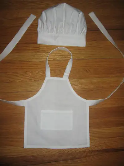 Great for the little 'chef to be'. Brand new white apron and chef hat. Adjusts with velcro. Should f...