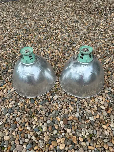 Farm or Industrial light fixtures. Have 2 but will sell individually Were being used with mercury va...