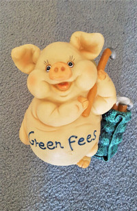 Plastic piggy bank for green fees collection