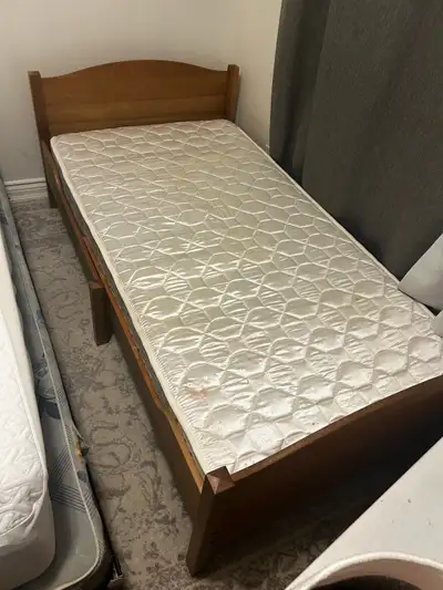 This is a Lade twin bed frame from Ikea, perfect for a child's room or a guest room. It's sturdy and...