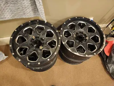 Rims of a 2019 gmc crewcab one rim has curb rash the rest are like new call or text 403-485-3582