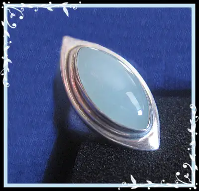 AQUAMARINE CABOCHON STERLING SILVER Asking $250.00 A superb and substantial ring in sterling silver...