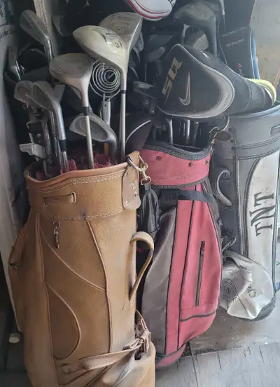 Collection of golf bags and clubs. $3-$5 each for old clubs, View more