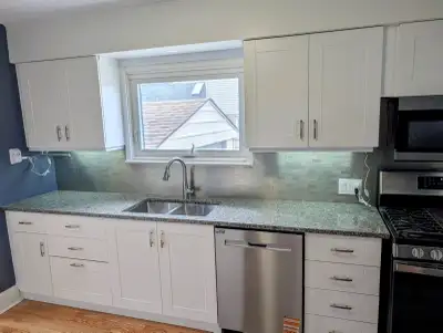 2~Bedroom, Plus Large Family Room, Plus Bright Sun Room, Main floor Apartment in House. Totally sepa...