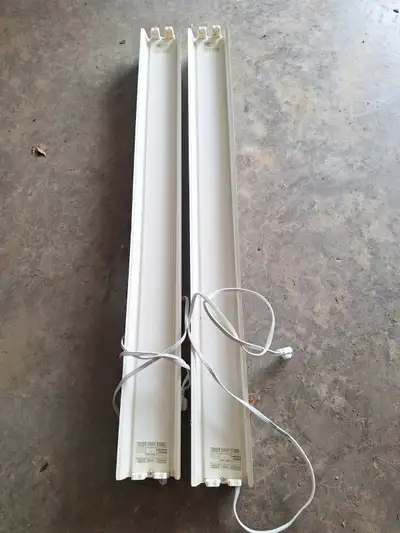 Fluorescent light -plug in, 2 bulb fixture. 2 Units, View more