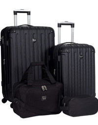 Unused Traveler's 4 Piece Luggage set- Midtown Collection