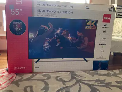 RCA 4K Ultra HD television and stand. Purchased new in September.