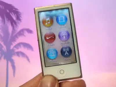 16GB Apple iPod Nano 7th Generation Touch Space in gold color 《 LCD screen is dark with a bit of dam...