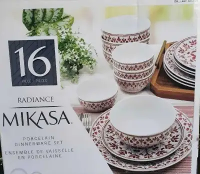 This Mikasa Radiance porcelain 16-piece dinnerware set features a beautiful floral pattern, perfect...