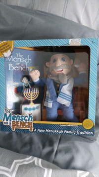 Brand new in the Box Mensch on a bench