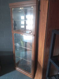 Glass corner cabinet with gloss doors
