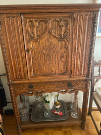 Carved Oak cupboard/armoire