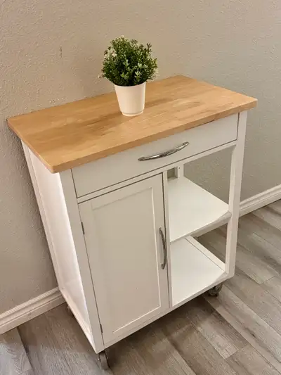 Excellent condition. The drawer functions smoothly. Sturdy design with smoothly rolling wheels. Come...