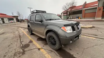Great car, in good condition! New shocks, new tires, new battery, leather interior, 2 inch lift, roo...