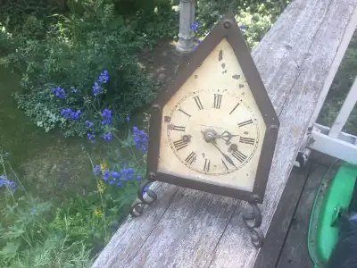 A table brass house clock "Provence" made as an exact reproduction of the original old mantel clock...