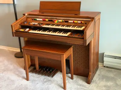 Bring musical charm into your home with this vintage Yamaha Electone organ, featuring a two-level ke...