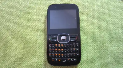 :: four (4) cellphones with cases and chargers included :: selling as a lot -- all together / no sep...