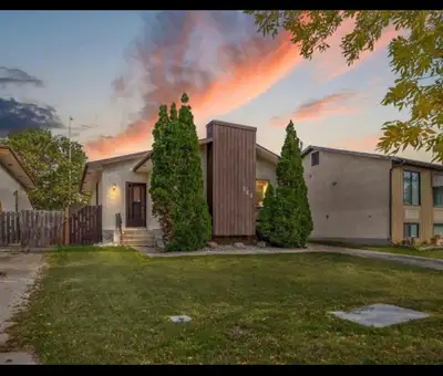 2 bedroom, dinning and living room bungalow near Tyndall Park market . Oversizes garage . Contact 20...