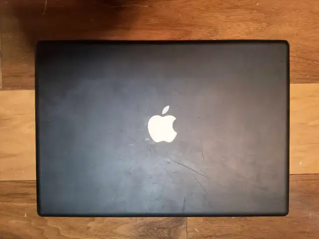 Black 2007 MacBook, OS X Lion62863267885569121