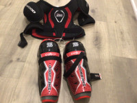 Brand new Sherwood junior hockey shoulder pad, shin guard