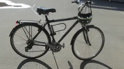 In very good condition looks almost new.......21 speeds road touring bike with back and front custom...