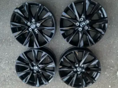 For sale are a set of used Mazda CX-5 rims, sized at 19 inches, featuring a sleek black finish. Thes...