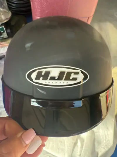 HJC helmet. New. Removable inside ear covers. Size Large. $20 obo