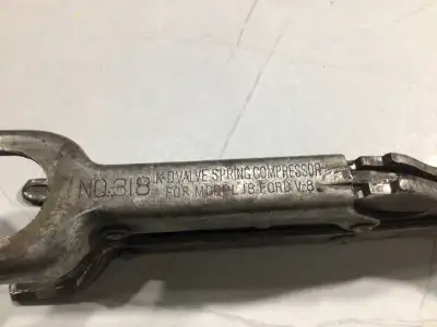 This is a used KD # 318 valve spring compressor, designed for the Model 18 Ford V-8 engine. Made in...