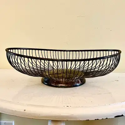 Beautiful 1950’s silver-plated bread basket by Wm. A. Rogers. Could do with a good polish but is oth...