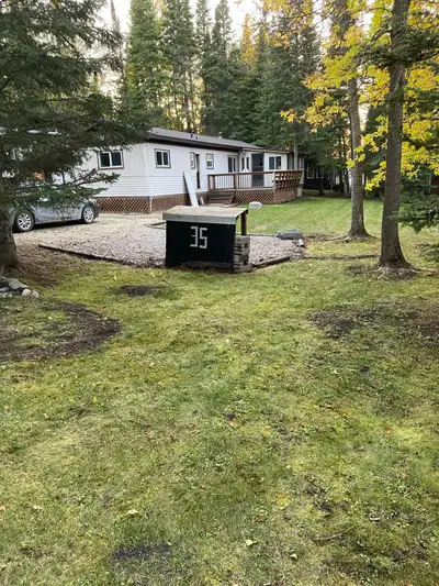 House trailer with attached rec room. 2 bedrooms and 1 bath. Sleeps 5+. There is a deck attached as...
